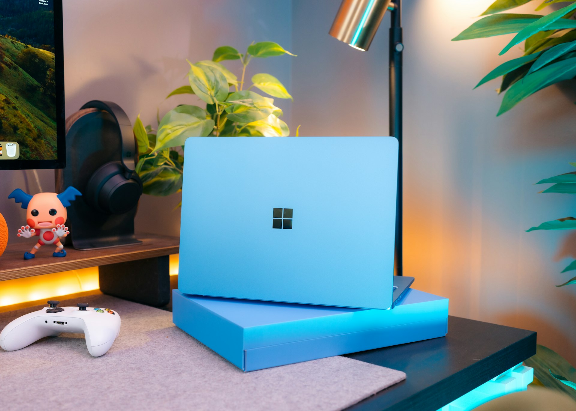 A laptop computer sitting on top of a desk